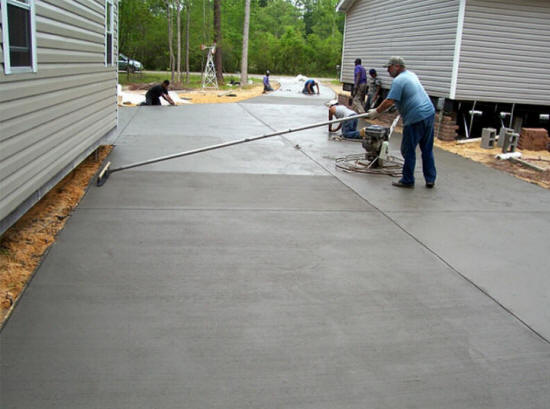 How do you pour a concrete floor in a garage?